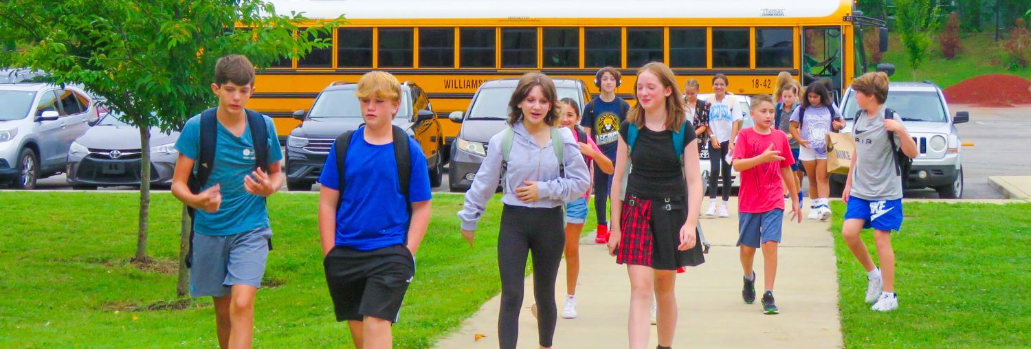 Students Walking into Building